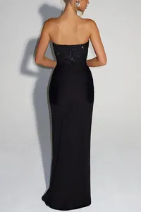 Detailed back view of a sophisticated black sequined strapless floor-length evening gown