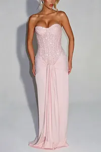 Elegant pink sequined strapless evening gown featuring a slim fit and sophisticated draped front detail