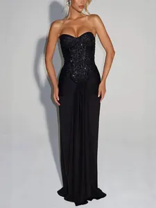 Elegant black strapless evening gown with sequined bodice and floor-length skirt