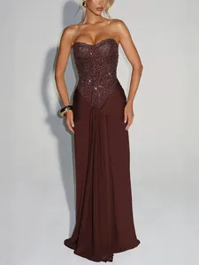 Elegant strapless sequined bodice maxi dress in chocolate brown with draped skirt detail