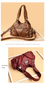 Vintage Handtasche aus weichem Leder in Braun und Burgunderrot mit vielen Reißverschlüssen