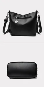 Detailed views of black textured leather bag showing back zipper and sturdy bottom