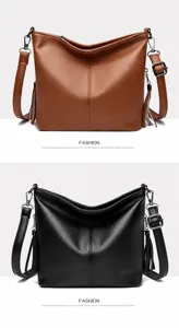 High-quality textured leather bucket bags with tassel details in brown and black colors