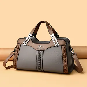 Elegante borsa a mano in pelle bicolore con finitura testurizzata
