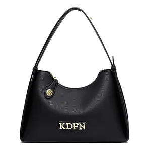 Classic black pebbled leather shoulder bag for women with gold metallic logo detail