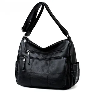Bolso bandolera de piel suave negra para mujer con múltiples bolsillos con cremallera