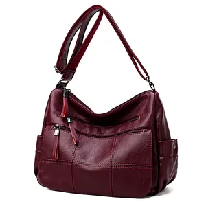 Elegante bolso de hombro de piel suave color burdeos para mujer con múltiples bolsillos
