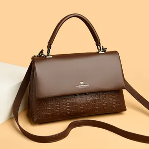Elegant classic brown leather satchel handbag with kangaroo logo and top handle for women