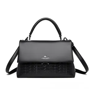 Elegant black leather top-handle handbag with kangaroo logo and adjustable shoulder strap