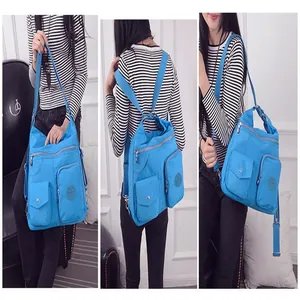 Vielseitiger hellblauer Oxford-Rucksack und Umhängetasche mit mehreren Taschen