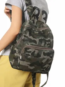 Fashionable camouflage mini backpack for women, casual and lightweight for daily travel.