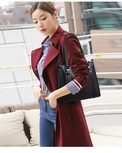 Elegant black large capacity tote bag for professional commute shown with model outfit