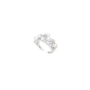Elegant French style adjustable silver ring featuring white pearls and shimmering crystals