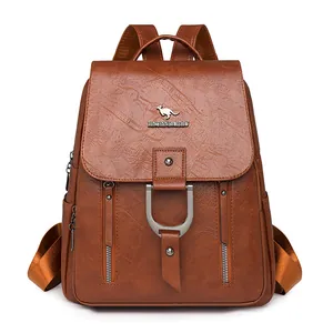 Sac à dos moderne en cuir PU marron pour femmes avec texture crocodile et logo kangourou