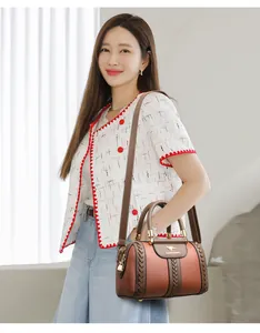 Fashion contrast color crossbody handbag for women styled with a casual summer outfit