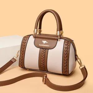 Elegant cream and brown color-blocked handbag with braided details and gold hardware