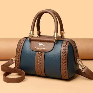 Elegant color-block blue and brown leather handbag with kangaroo logo and top handles