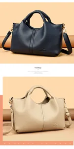 Elegant pebbled leather handbags in navy and beige, versatile 2025 fashion collection
