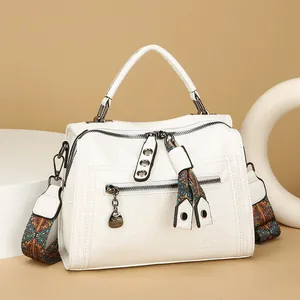 Stylish white Boston handbag for women with patterned wide strap and zipper detail