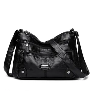 Classic black multi-pocket crossbody shoulder bag for women with silver hardware