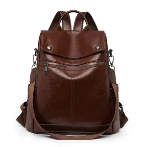 Vintage brown faux leather anti-theft backpack for women with flap cover
