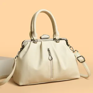 Elegante cremefarbene Lederhandtasche mit Vintage-Klippverschluss und Tragegriff für Damen