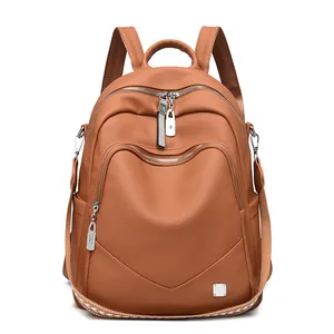 Zaino da donna elegante in morbida pelle marrone con tasche multiple e cerniere argentate