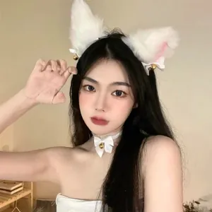 White plush cat ear headband with matching bell choker shown on an Asian model