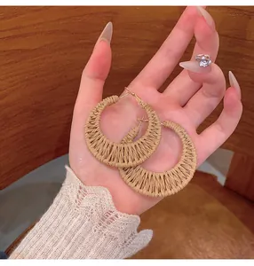 Handmade straw woven rattan moon earrings for vacation beach photography fashion jewelry