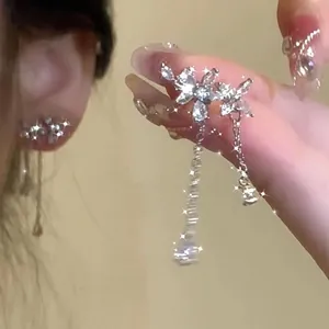 Sparkling silver butterfly dangle earrings with zircon crystals and elegant long chains