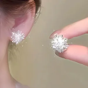 Sparkling S925 silver starburst stud earrings with a trendy French floral design for women.