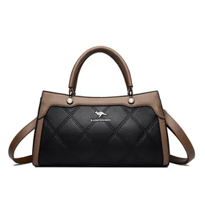 Elegant black and brown pebbled leather handbag with kangaroo logo and pearl detail