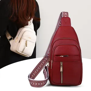Fashionable litchi texture chest bag for women with wide patterned shoulder strap detail