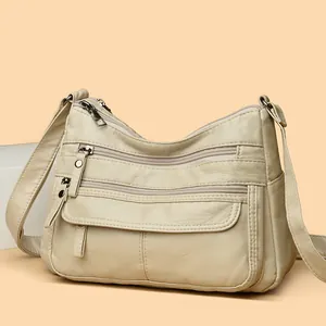 Sac bandoulière en cuir PU lavé beige pour femmes avec plusieurs poches zippées devant
