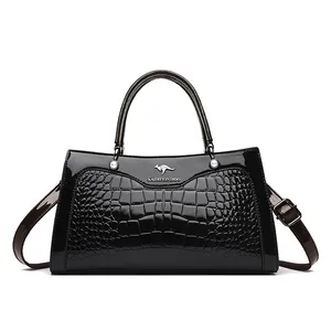 Elegant black crocodile-textured women's handbag with top handle and shoulder strap