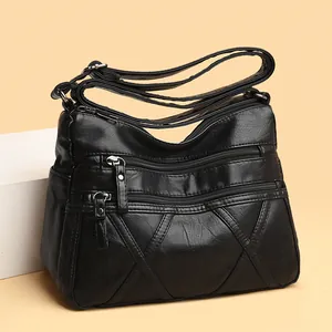 Elegant black multi-layer soft leather crossbody bag for women with adjustable strap