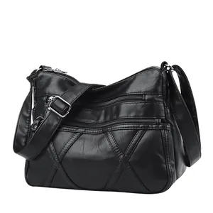 Elegant black multi-layer soft leather crossbody bag for women with adjustable strap