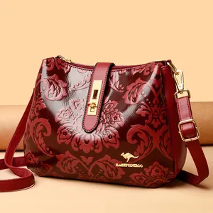 Vintage embossed wine red leather crossbody shoulder bag for middle aged women