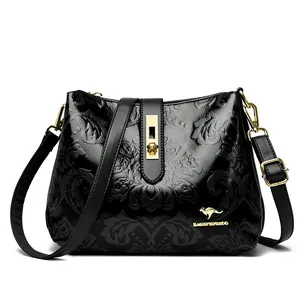 Vintage black embossed leather crossbody bag with golden kangaroo logo for women