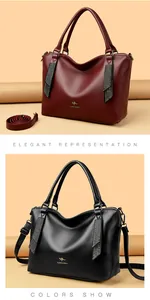 Elegantes bolsos grandes para mujer en cuero burdeos y negro con el logo del canguro
