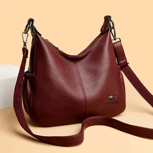 Elegant burgundy pebbled leather hobo crossbody bag for women with large capacity