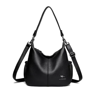 Black pebbled leather hobo shoulder bag for women with adjustable strap and kangaroo logo