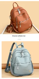 Large capacity soft leather backpacks in brown and blue with multi-zipper compartments