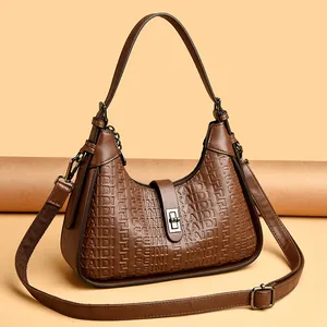 Elegant brown embossed monogram hobo bag for women with adjustable strap