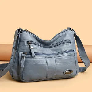 Elegant multi-pocket blue leather crossbody bag for middle-aged women