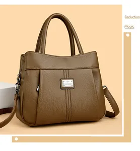 Vintage brown lychee grain leather handbag with an adjustable crossbody strap