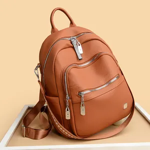 Large capacity brown soft leather multi-purpose backpack for women with multiple zippers