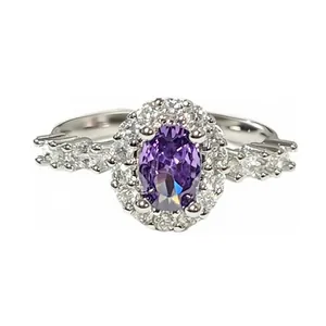 Detailed view of an exquisite ring featuring a purple oval gemstone haloed by white diamonds