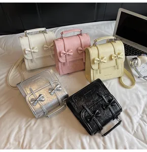 Fashionable mini backpacks with bow accents in five colors for college students