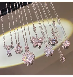 Sparkling silver-tone necklaces featuring various zircon butterfly and flower pendants